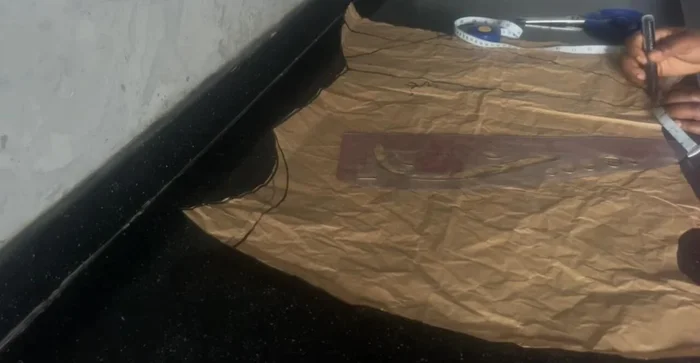 Cut the pattern. For the off-shoulder design, mark and cut off 3 inches from the shoulder area, and then cut 9 inches from the shoulder section that will fall, and 5 inches from the other shoulder (adjust according to your shoulder width).