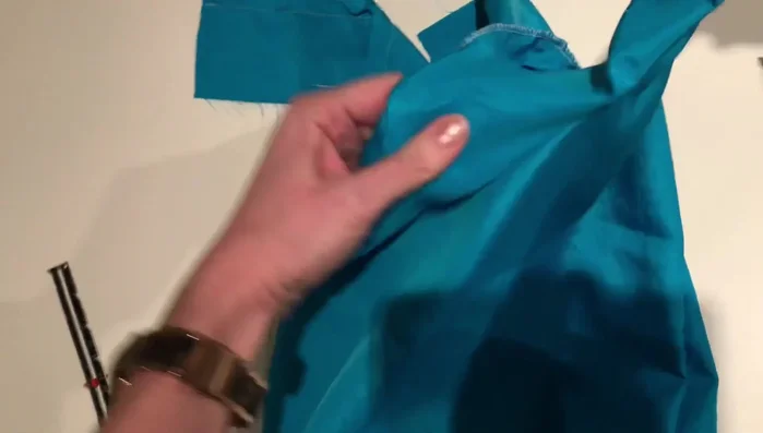 Press edges and sew the straps together, leaving an opening at the top. Turn under the seam allowance and press it flat.