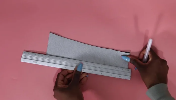 Cut and sew belt loops, top stitching them onto the skirt.