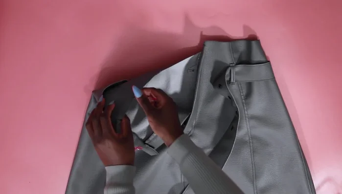 Finish the waistline by turning in the edge and using clips to secure. Top stitch.