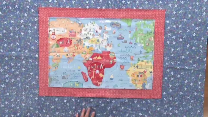 Pin the center: Using the creases, find the center point of all layers. Insert a straight pin through the center to align the layers.