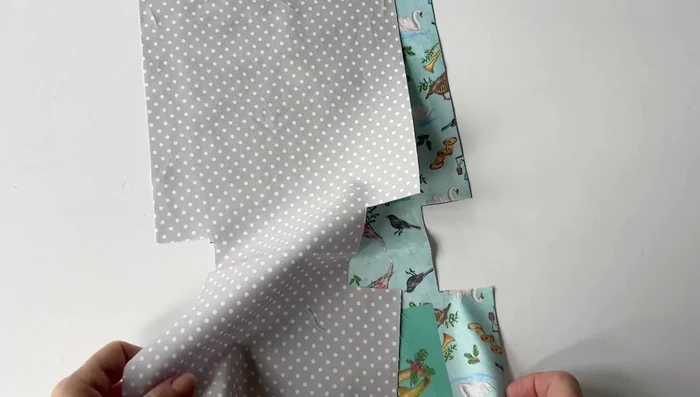 Cut a lining fabric piece using the outer piece as a pattern.