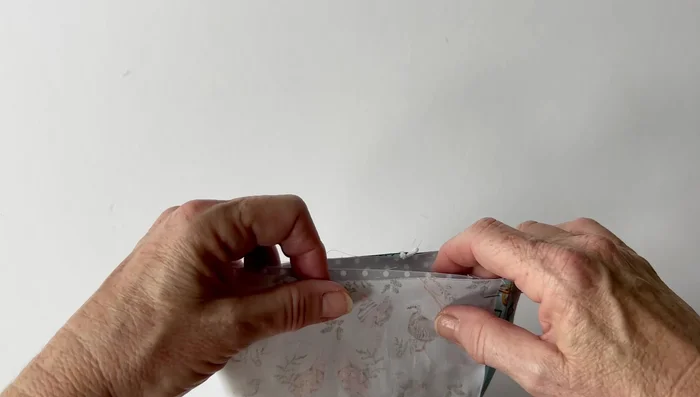 Sew around the top edge.