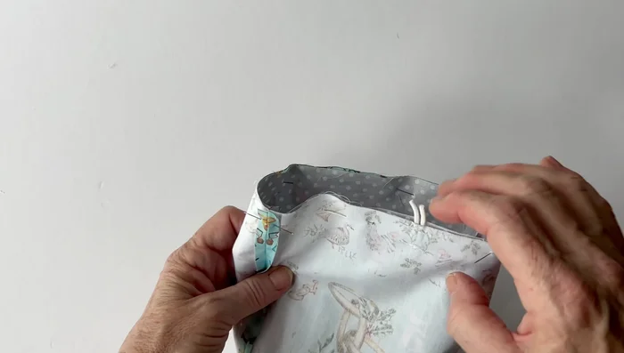 Sew around the top edge.