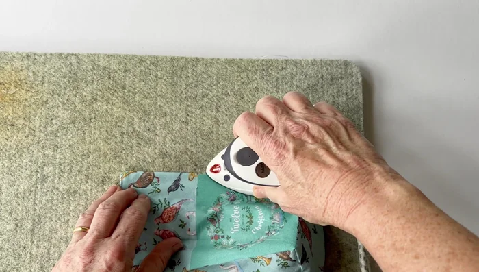 Press the bottom corners to create crisp edges and structure.