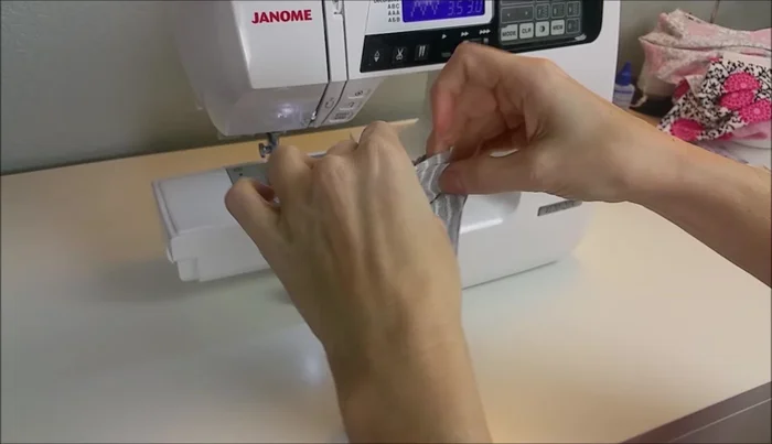 Sew the long edges together using a straight stitch with a ¼ inch seam allowance. Increase stitch length to 3.