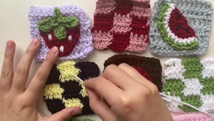 Continue sewing the panels together by alternating between the panels, securing stitches between them and tying off at the end. It's okay to adjust the stitches if they are uneven or spaced strangely.