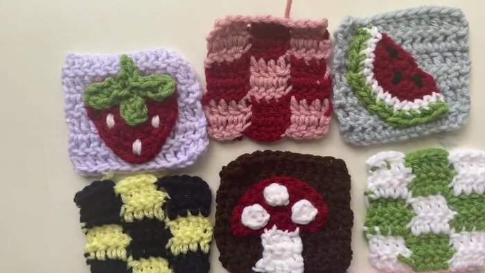 Organize your granny square panels for sewing. Avoid placing similar colors adjacent to each other.