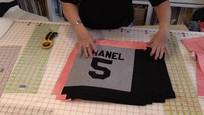 Sew blocks together in rows and add final borders to complete the quilt.