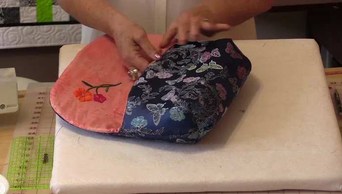 Press the bag and add any finishing touches such as decorative embroidery or appliqués.