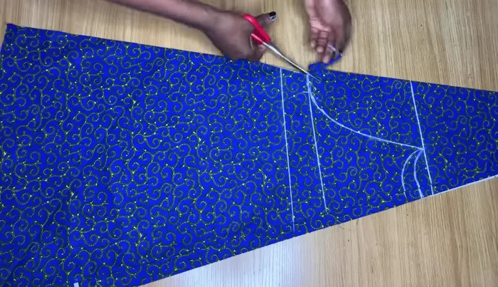 Sew the added fabric pieces to the back piece.