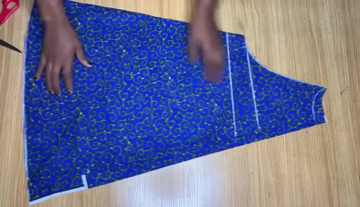 Sew the added fabric pieces to the back piece.