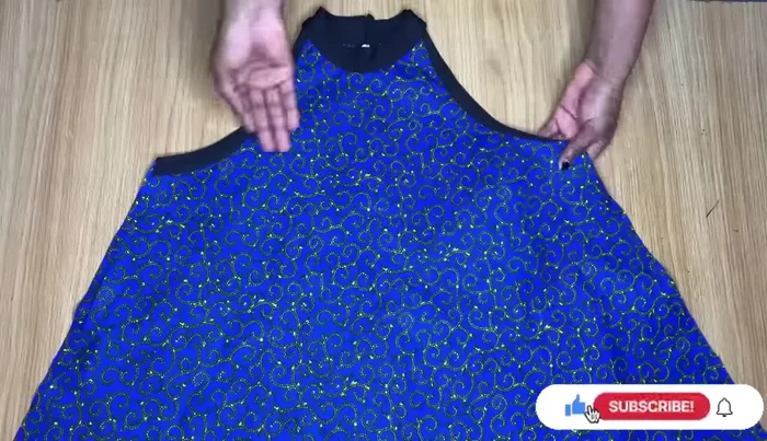 Pleat and sew the ruffle onto the dress hem.