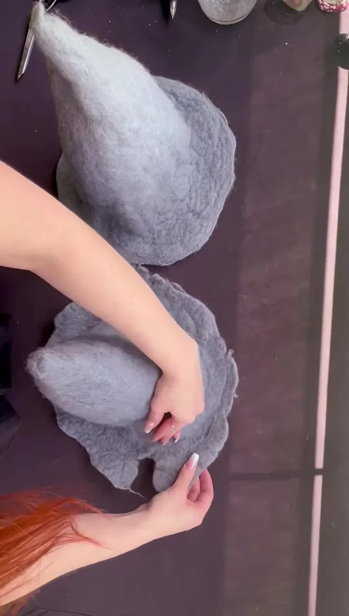 Once dry, shape the hat by gently pulling and molding the brim and sides.