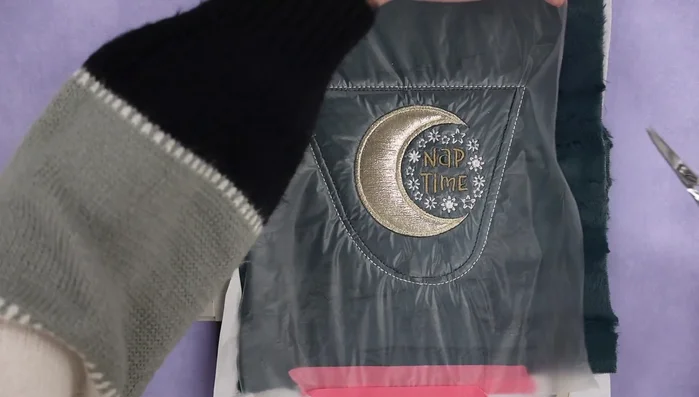 Trim excess fabric and remove the water-soluble topper.