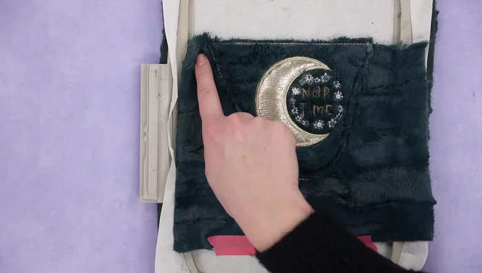 Remove from the hoop, leaving the seam allowance.