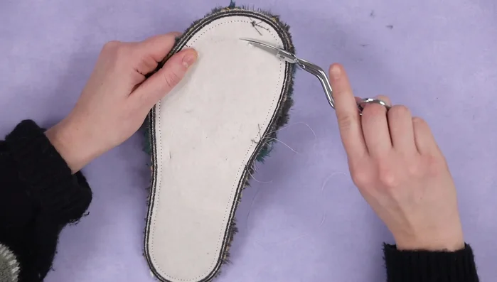 Remove stabilizer from behind the slipper.