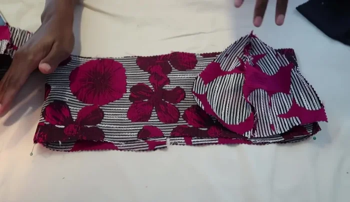 Attach the bralette cups to the underbust piece: Fold the underbust piece in half (mine is 80cm long). Place the bralette cups on top, pin, and sew.