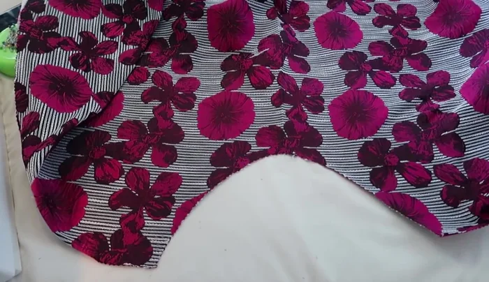 Prepare skirt pieces: Cut out three pieces for the skirt (front, two back pieces). Add pockets to the back pieces (refer to the linked tutorial).