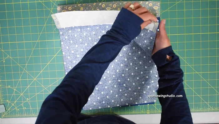 Assemble interior pieces. Sew sides and bottom (1/2 inch seam allowance). Leave opening to turn right side out.