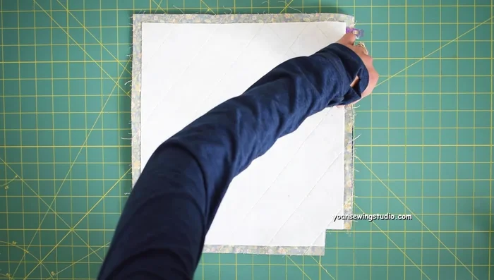 Assemble front and back exterior pieces. Sew sides and bottom (1/2 inch seam allowance). Clip corners and sew.