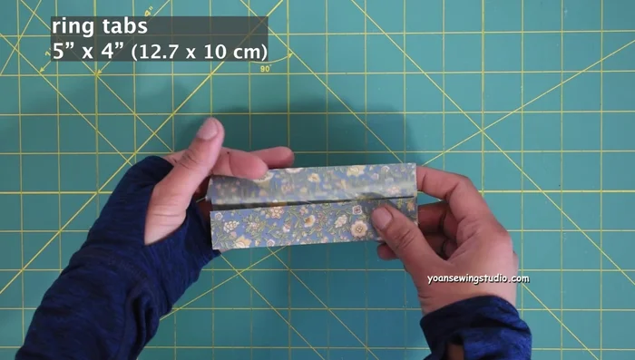 Attach ring tabs to exterior shell. Sew (1/4 inch seam allowance).