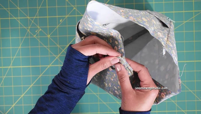 Attach ring tabs to exterior shell. Sew (1/4 inch seam allowance).