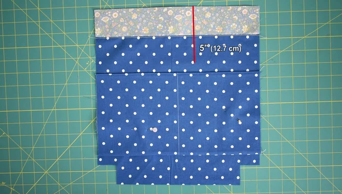 Prepare zipper panels. Fold and press (1/2 inch). Sew zipper to panels (1/8 inch seam allowance).