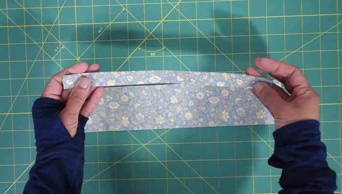 Prepare zipper panels. Fold and press (1/2 inch). Sew zipper to panels (1/8 inch seam allowance).