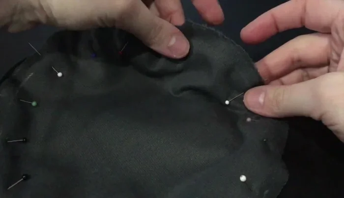 Turn the base inside out and stuff it with pillow stuffing. Sew the opening closed using a ladder stitch.