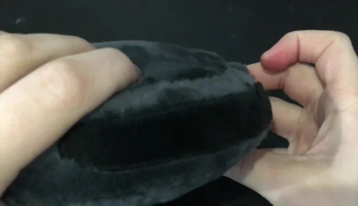 Create the faceplate using part seven. Pin the excess fabric to the inside and stitch around the edge. Attach the interface panel (parts 8 & 9), center buttons (parts 6 & 10), scheduling buttons (part 12), and handle (part 11). Add embroidery for detail.