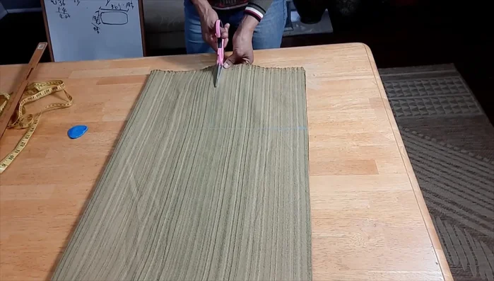 Cut out the corners to create a box shape.