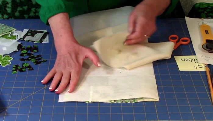 Fuse interfacing: Use a damp cloth and iron to permanently adhere interfacing to the banner (follow interfacing instructions).