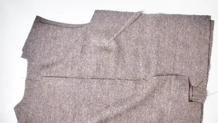 Sew the side seams and shoulder seams of the bodice (front and back pieces right sides together) with a 3/8 inch seam allowance. Press seams open.