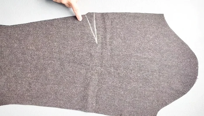 Transfer and sew darts on the sleeve pieces. Press darts downward.