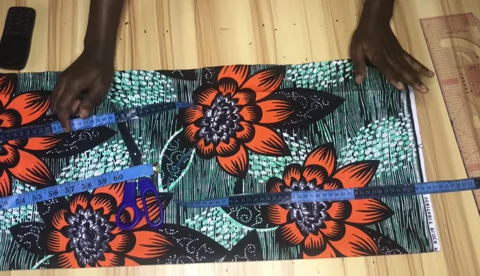 Mark points 2 inches above the knee line and subtract 1.5-2 inches from your hip measurement for the knee and hemline.