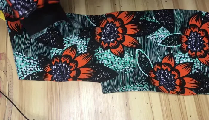 Sew the back pieces together, using a loose stitch for the zip allowance and a tight stitch for the rest of the seam.