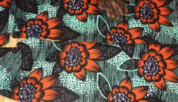 Shape the skirt by joining the front and back pieces, ensuring accurate measurements. Sew the seams.