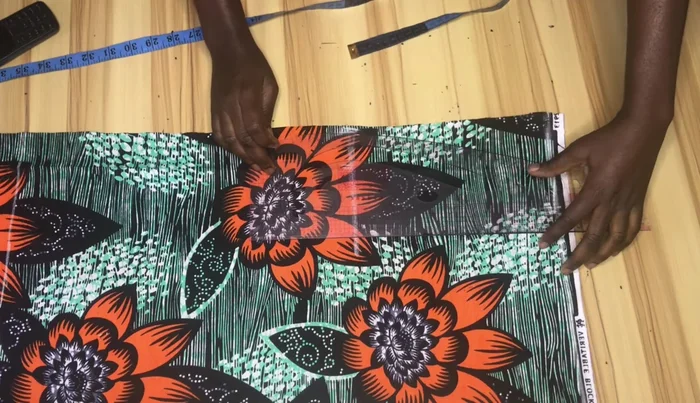 Mark points 2 inches above the knee line and subtract 1.5-2 inches from your hip measurement for the knee and hemline.