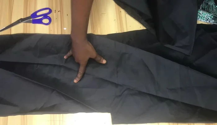 Cut the lining pieces, matching the front and back pieces. Trim the lining hemline by 1 inch.