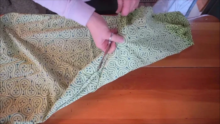 Turn the pillowcase right side out, poke out the corners, and iron the edges.