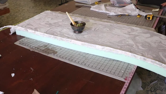 Pin and sew welt to the front fabric piece.