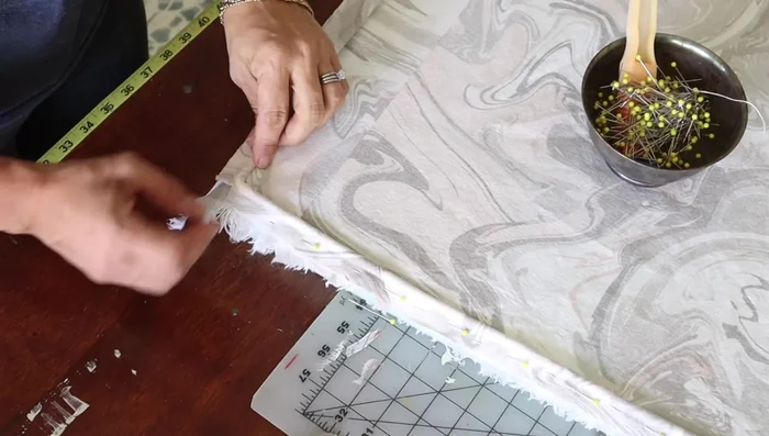 Pin and sew welt to the front fabric piece.