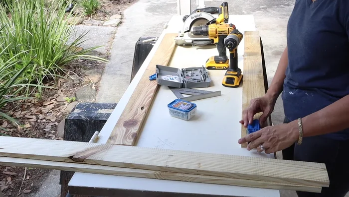 Attach luan plywood to frame, then glue foam to plywood.