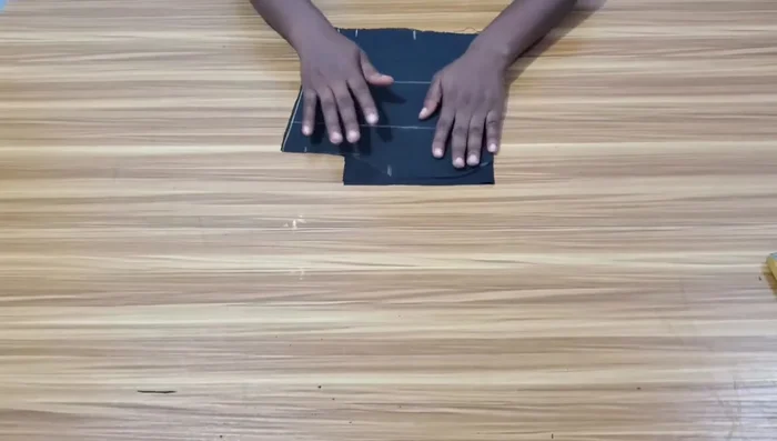 Stitch the facing to the neckline of both bodice pieces.