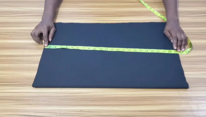 Attach the sleeve bands, and then attach the sleeves into the armholes of the dress.