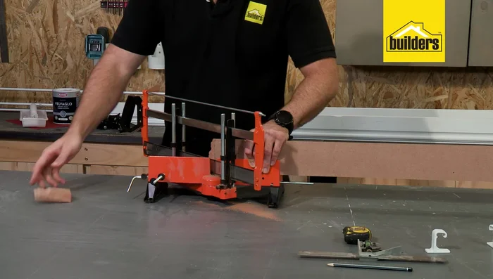 Cut the MDF skirting. Make 45-degree miter cuts on the ends of the pelmet's front piece. Cut the side pieces to the calculated depth (140mm in this example). Ensure accurate measurements from the inside of the miter cuts.