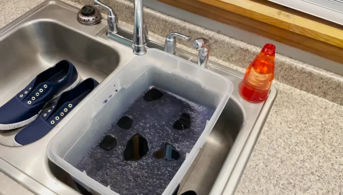 Let it sit: Allow the shoes to sit with the fixative for 20 minutes.