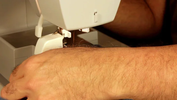 Sew over the first hump and second hump without issue. Backstitch to secure.