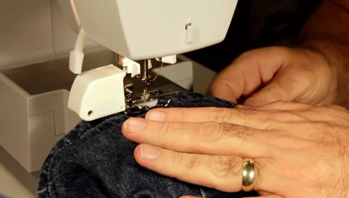 Sew over the first hump and second hump without issue. Backstitch to secure.